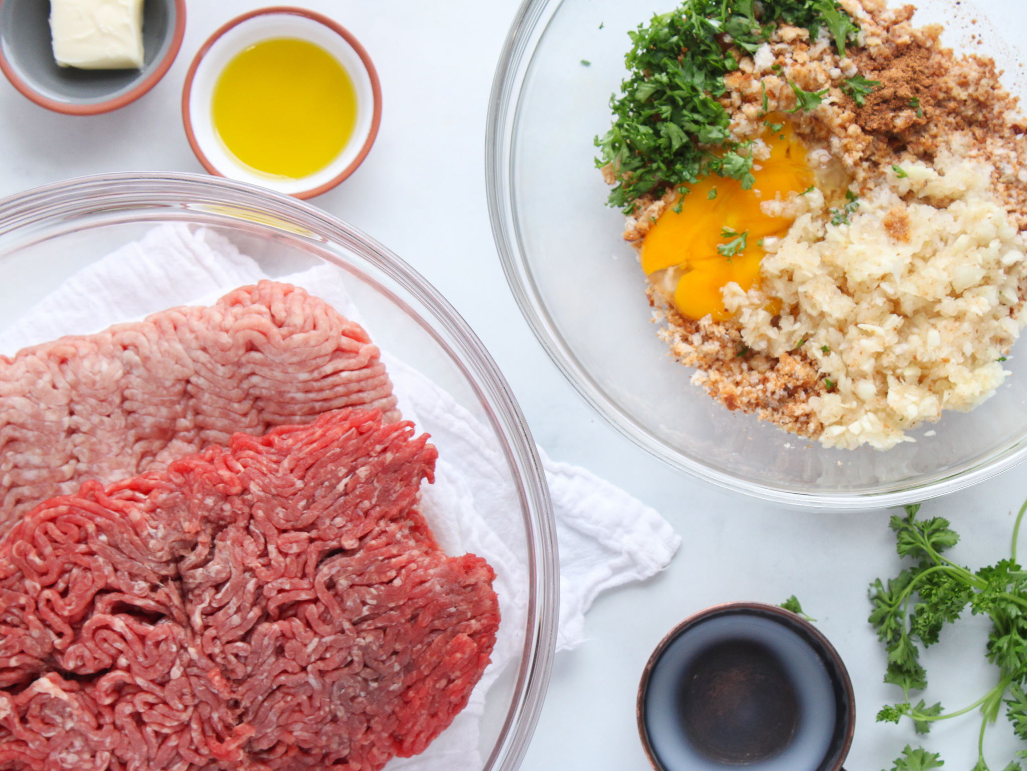 Swedish meatball ingredients being made about to be mixed and rolled into balls and cooked.